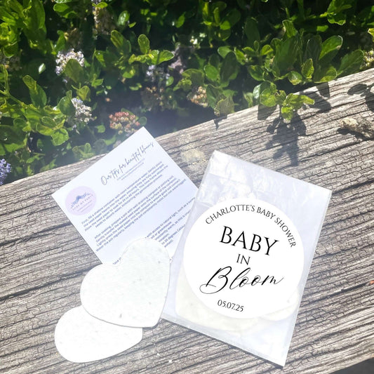 Baby in bloom wildflower seeded paper heart favours